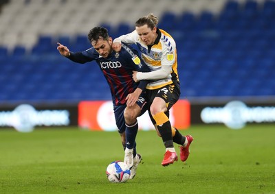 090321 Newport County v Bradford City, Sky Bet League 2 - Aaron Lewis of Newport County takes on Billy Clarke of Bradford City