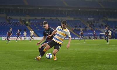090321 Newport County v Bradford City, Sky Bet League 2 - Padraig Amond of Newport County holds off Paudie O'Connor of Bradford City