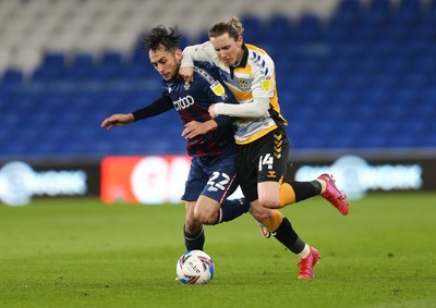 090321 Newport County v Bradford City, Sky Bet League 2 - Aaron Lewis of Newport County takes on Billy Clarke of Bradford City