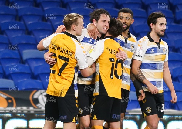 090321 Newport County v Bradford City, Sky Bet League 2 - Matty Dolan of Newport County is congratulated by team mates after he scores the winning goal from the penalty spot with the final kick of the match