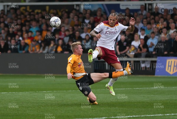091021 - Newport County v Bradford City, Sky Bet League 2 - Ollie Cooper of Newport County looks to get a shot at goal as Oscar Threlkeld of Bradford City challenges