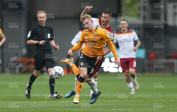 091021 - Newport County v Bradford City, Sky Bet League 2 - Ollie Cooper of Newport County is brought down by Paudie O'Connor of Bradford City