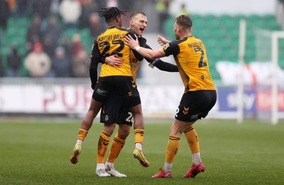 110323 - Newport County v Bradford City - SkyBet League Two - Mickey Demetriou of Newport County celebrates with team mates after scoring a goal