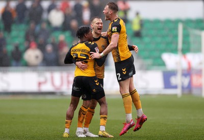 110323 - Newport County v Bradford City - SkyBet League Two - Mickey Demetriou of Newport County celebrates with team mates after scoring a goal