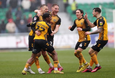 110323 - Newport County v Bradford City - SkyBet League Two - Mickey Demetriou of Newport County celebrates with team mates after scoring a goal