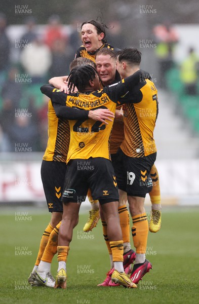 110323 - Newport County v Bradford City - SkyBet League Two - Mickey Demetriou of Newport County celebrates with team mates after scoring a goal