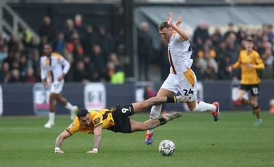 150225  Newport County v Bradford City, EFL Sky Bet League 2 - Jack Shepherd of Bradford City brings down Courtney Baker-Richardson of Newport County and is shown a red card for the challenge