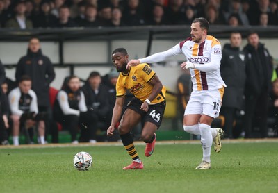 150225  Newport County v Bradford City, EFL Sky Bet League 2 - David Ajiboye of Newport County is challenged by Antoni Sarcevic of Bradford City