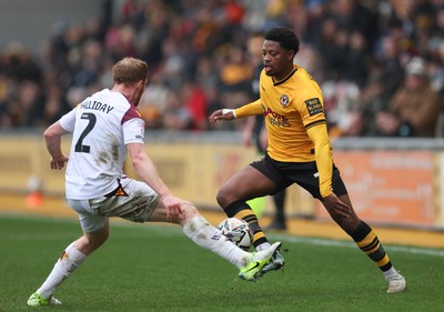 150225  Newport County v Bradford City, EFL Sky Bet League 2 - Bobby Kamwa of Newport County takes on Brad Halliday of Bradford City