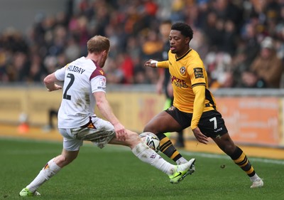 150225  Newport County v Bradford City, EFL Sky Bet League 2 - Bobby Kamwa of Newport County takes on Brad Halliday of Bradford City