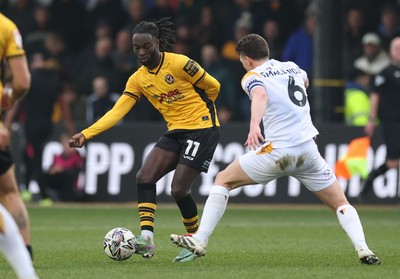 150225  Newport County v Bradford City, EFL Sky Bet League 2 - Cameron Antwi of Newport County takes on Richard Smallwood of Bradford City