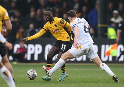 150225  Newport County v Bradford City, EFL Sky Bet League 2 - Cameron Antwi of Newport County takes on Richard Smallwood of Bradford City