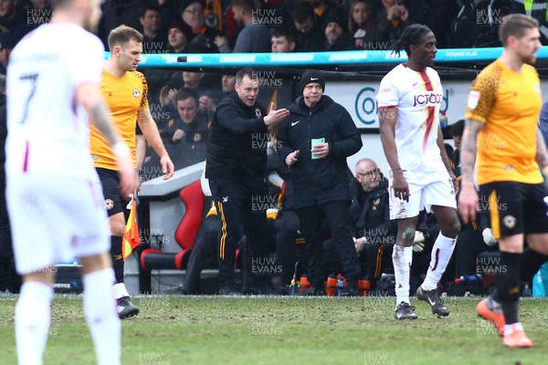 220220 - Newport County vs Bradford City - Sky Bet League 2 - Manager of Newport County Michael Flynn shares an opinion with Fourth Official Paul Hobday