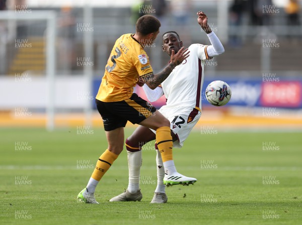 230923 - Newport County v Bradford City, EFL Sky Bet League 2 - Adam Lewis of Newport County and Clarke Oduor of Bradford City compete for the ball