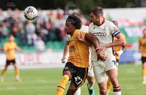 230923 - Newport County v Bradford City, EFL Sky Bet League 2 - Olly Thomas of Newport County and Sam Stubbs of Bradford City compete for the ball
