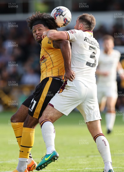 230923 - Newport County v Bradford City, EFL Sky Bet League 2 - Olly Thomas of Newport County and Liam Ridehalgh of Bradford City compete for the ball