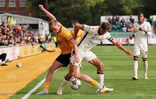 230923 - Newport County v Bradford City, EFL Sky Bet League 2 - Will Evans of Newport County and Sam Stubbs of Bradford City compete for the ball