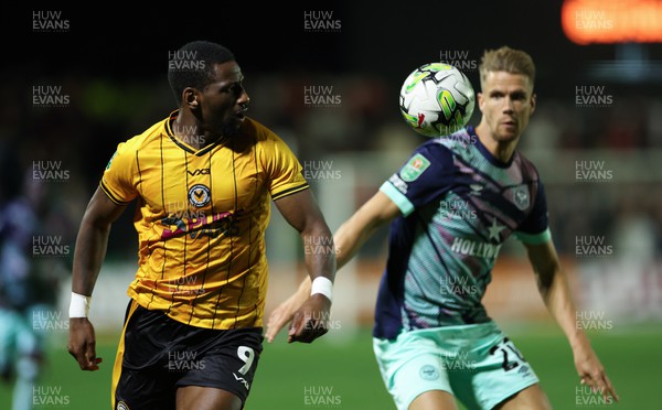 290823 - Newport County v Brentford, EFL Carabao Cup - Omar Bogle of Newport County wins the ball from Kristoffer Ajer of Brentford