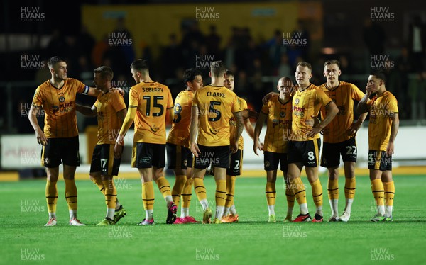 290823 - Newport County v Brentford, EFL Carabao Cup -Newport County players after the penalty shootout