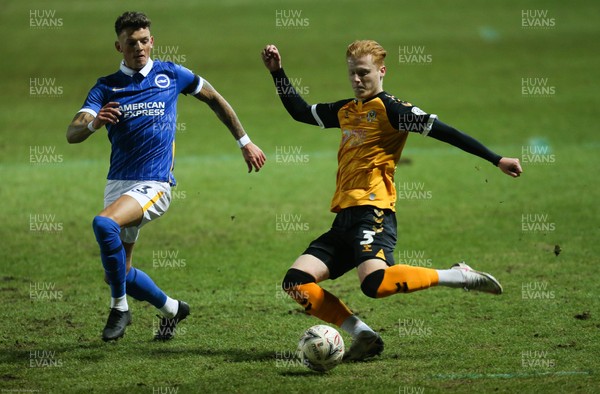 100121 - Newport County v Brighton and Hove Albion, FA Cup Third Round - Ryan Haynes of Newport County crosses the ball as Ben White of Brighton closes in
