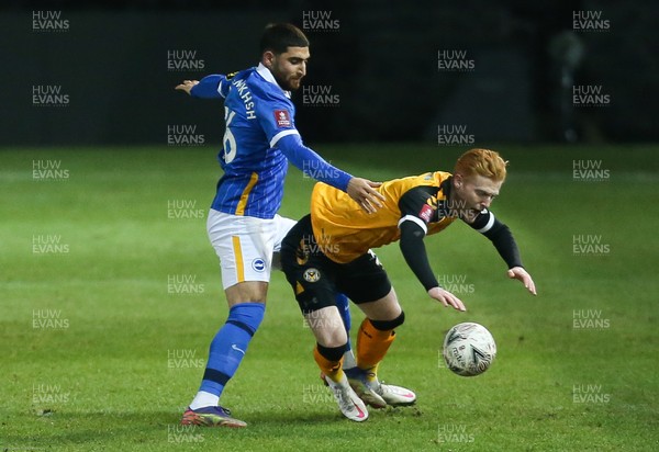 100121 - Newport County v Brighton and Hove Albion, FA Cup Third Round - Ryan Haynes of Newport County and Alireza Jahanbakhsh of Brighton compete for the ball