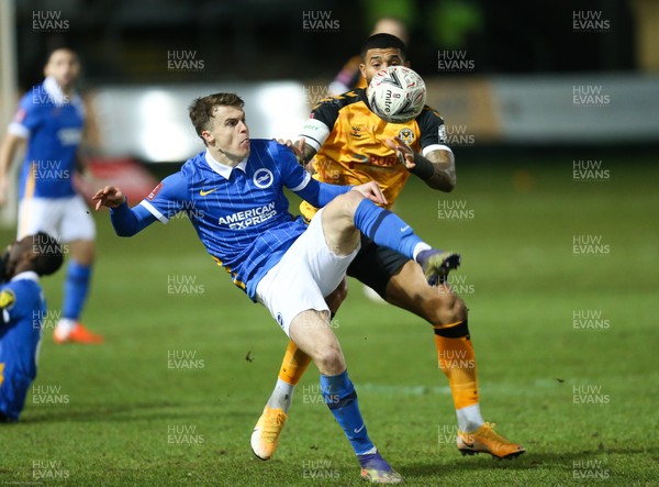 100121 - Newport County v Brighton and Hove Albion, FA Cup Third Round - Solly March of Brighton an Joss Labadie of Newport County compete for the ball