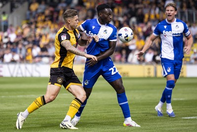060925 - Newport County v Bristol Rovers - Sky Bet League 2 - Cameron Evans of Newport County in action against Kamil Conteh of Bristol Rovers