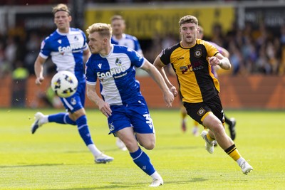 060925 - Newport County v Bristol Rovers - Sky Bet League 2 - Cameron Evans of Newport County in action against Jack Sparkes of Bristol Rovers