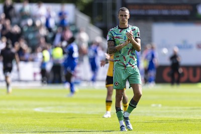 060925 - Newport County v Bristol Rovers - Sky Bet League 2 - Newport County goalkeeper Nik Tzanev applauds fans at full time