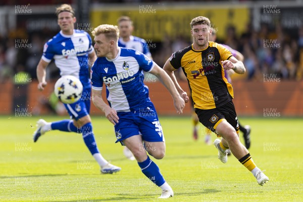 060925 - Newport County v Bristol Rovers - Sky Bet League 2 - Cameron Evans of Newport County in action against Jack Sparkes of Bristol Rovers