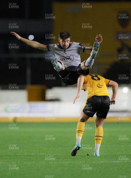 141123 - Newport County v Bristol Rovers, Bristol Street Motors EFL Trophy - Antony Evans of Bristol Rovers is upended by Bryn Morris of Newport County as they compete for the ball