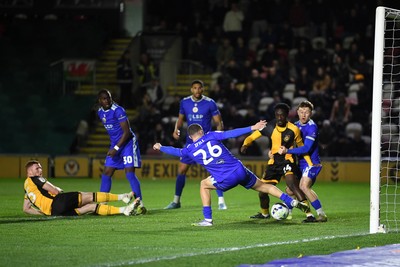 170326 - Newport County v Bromley - Sky Bet League 2 - Lee Jenkins of Newport County has hustled shot blocked by Marcus Ifill of Bromley