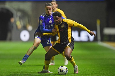 170326 - Newport County v Bromley - Sky Bet League 2 - Bobby Kamwa of Newport County is challenged by Sam German of Bromley