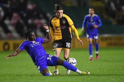 170326 - Newport County v Bromley - Sky Bet League 2 - Harrison Biggins of Newport County is challenged by Idris Odutayo of Bromley