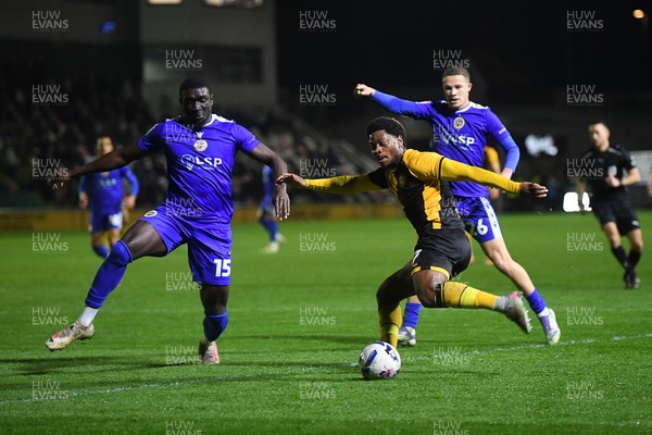 170326 - Newport County v Bromley - Sky Bet League 2 - Bobby Kamwa of Newport County is challenged by Jesse Debrah of Bromley