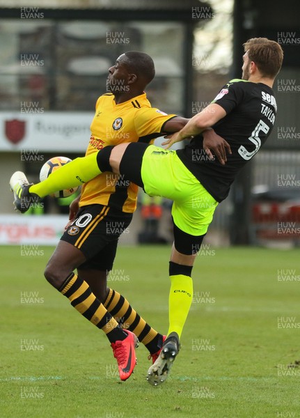 031217 - Newport County v Cambridge United, FA Cup Second Round - Frank Nouble of Newport County is challenged by Greg Taylor of Cambridge United