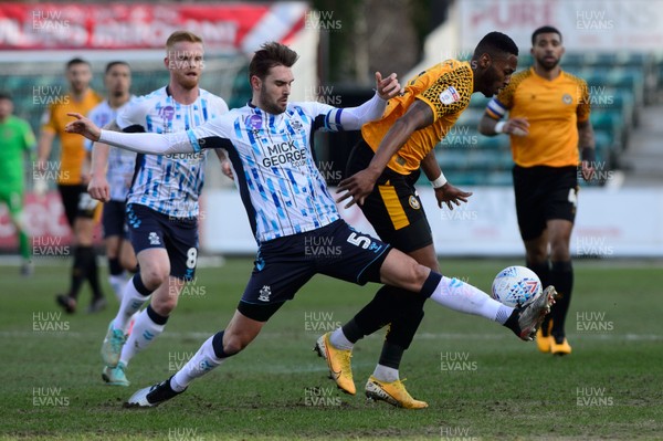 080220 - Newport County v Cambridge United - Sky Bet League 2 -   Greg Taylor of Cambridge tackles Jamille Matt of Newport