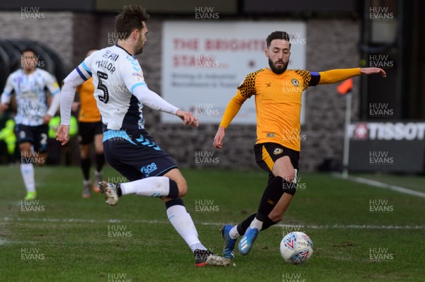 080220 - Newport County v Cambridge United - Sky Bet League 2 -  Josh Sheehan of Newport County is tackled by Greg Taylor of Cambridge United 
