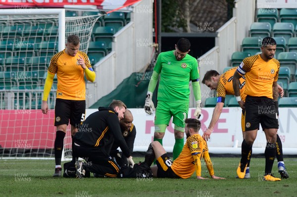 080220 - Newport County v Cambridge United - Sky Bet League 2 -  Josh Sheehan of Newport County is taken off injured 