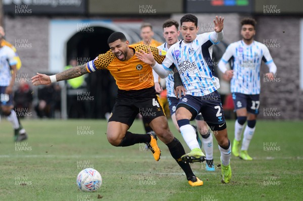 080220 - Newport County v Cambridge United - Sky Bet League 2 -  Joss Labadie of Newport County and Kyle Knoyle of Cambridge United compete for the ball 