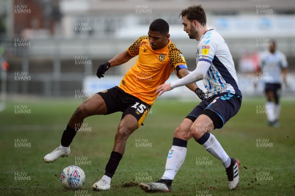 080220 - Newport County v Cambridge United - Sky Bet League 2 -  Tristan Abrahams of Newport County holds off Greg Taylor of Cambridge United 