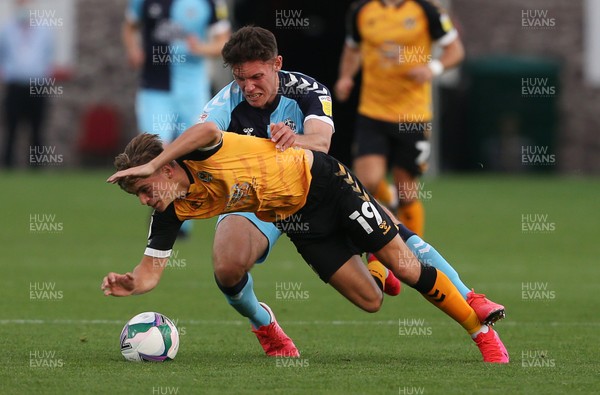 150920 - Newport County v Cambridge United - Carabao Cup - Scott Twine of Newport County is tackled by Paul Digby of Cambridge United