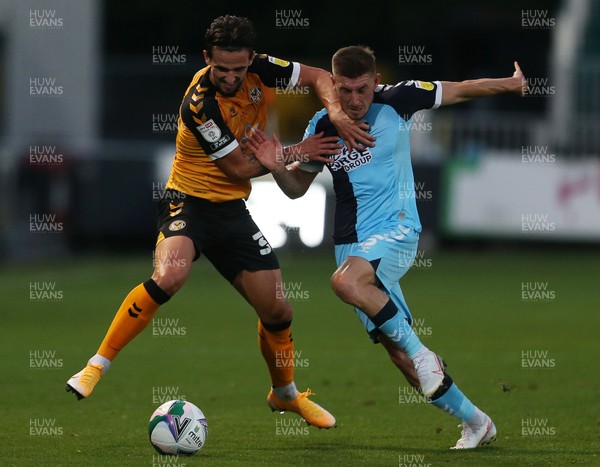 150920 - Newport County v Cambridge United - Carabao Cup - Liam Shephard of Newport County is challenged by Tom Knowles of Cambridge United