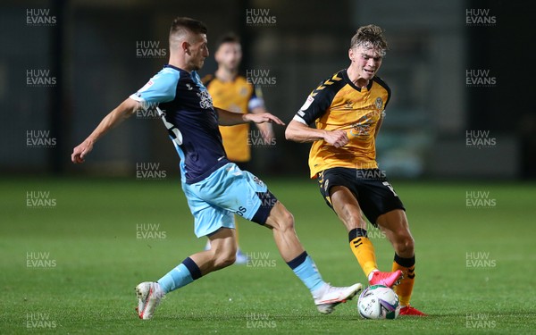 150920 - Newport County v Cambridge United - Carabao Cup - Scott Twine of Newport County is challenged by Kai McKenzie-Lyle of Cambridge United