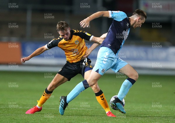150920 - Newport County v Cambridge United - Carabao Cup - Scott Twine of Newport County is tackled by Adam May of Cambridge United
