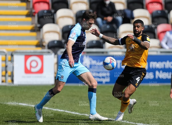 170421 Newport County v Cambridge United, Sky Bet League 2 - Joss Labadie of Newport County and Paul Digby of Cambridge United compete for the ball