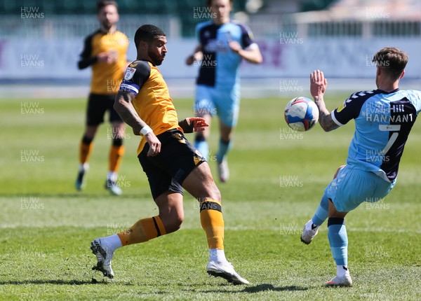 170421 Newport County v Cambridge United, Sky Bet League 2 - Joss Labadie of Newport County and Luke Hannant of Cambridge United compete for the ball