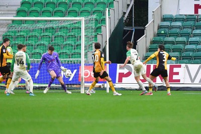 210226 - Newport County v Cambridge United - Sky Bet League 2 - Liam Bennett of Cambridge United scores their first goal with a header