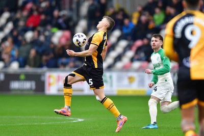 210226 - Newport County v Cambridge United - Sky Bet League 2 - Sven Sprangler of Newport County controls the ball