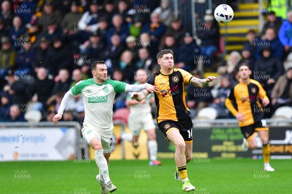 210226 - Newport County v Cambridge United - Sky Bet League 2 - Shane McLoughlin of Cambridge United and James Crole of Newport County 